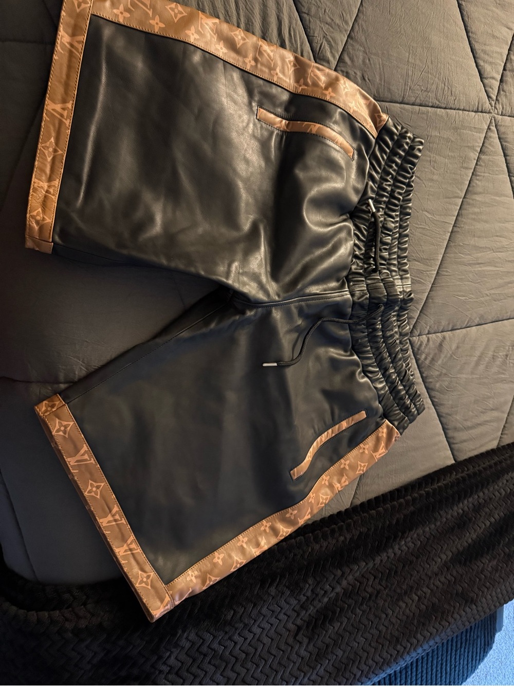 Louis Vuitton Black Leather Shorts with Brown Monogram Trim another one.